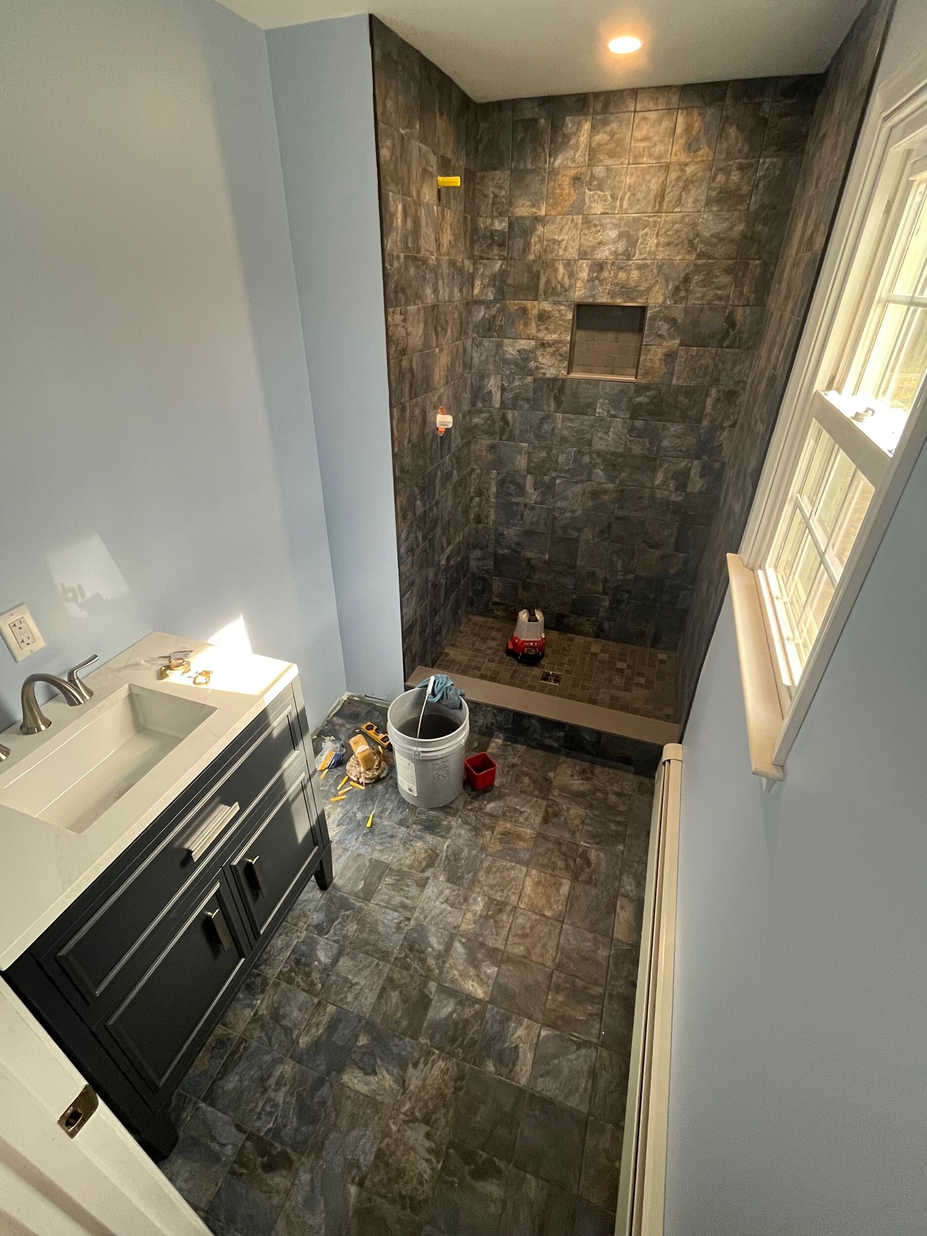 Finishing Stages of a Basement Remodel in Limerick and Double Bathroom Renovation in Pottstown